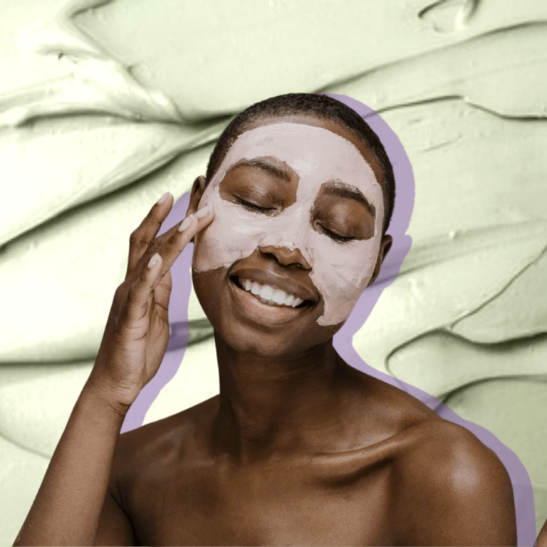 Beautiful black woman with short hair applying a face mask to her face. face masks for glowing skin