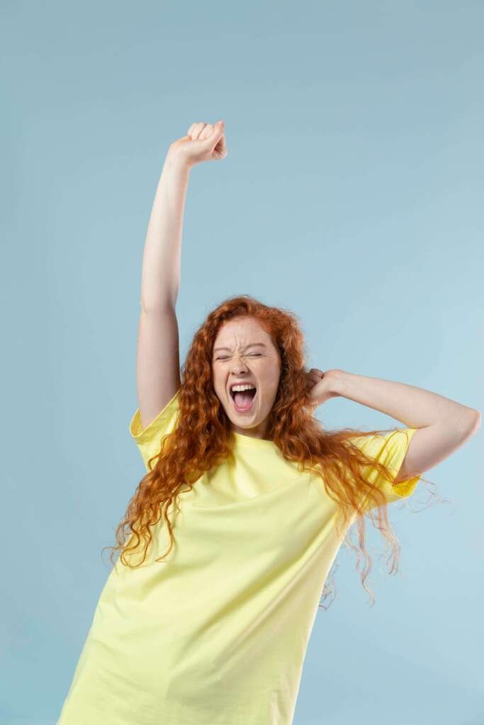 studio portrait young ginger woman