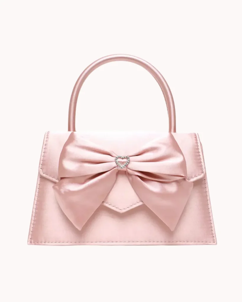 Pink diamante bow mini top handle bag. 