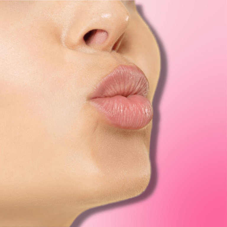 Close up of a woman pouting with pink lips