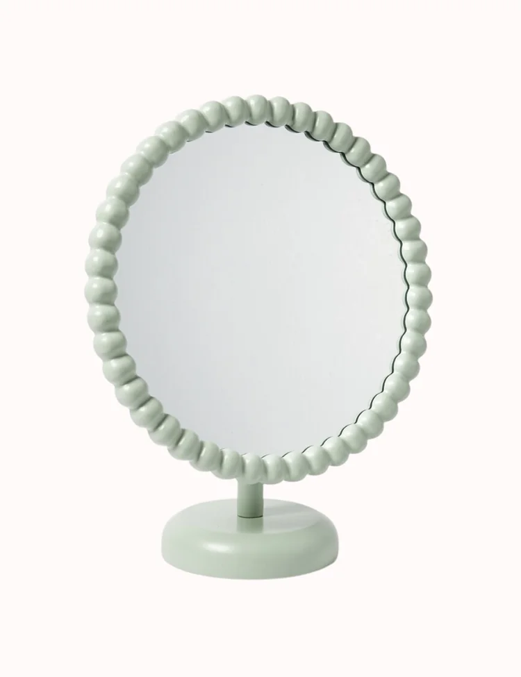 round mint green table bobbin mirror