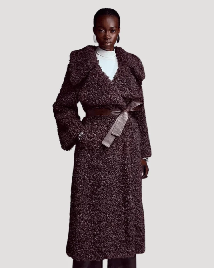 Model woman wears dark brown belted teddy midi coat