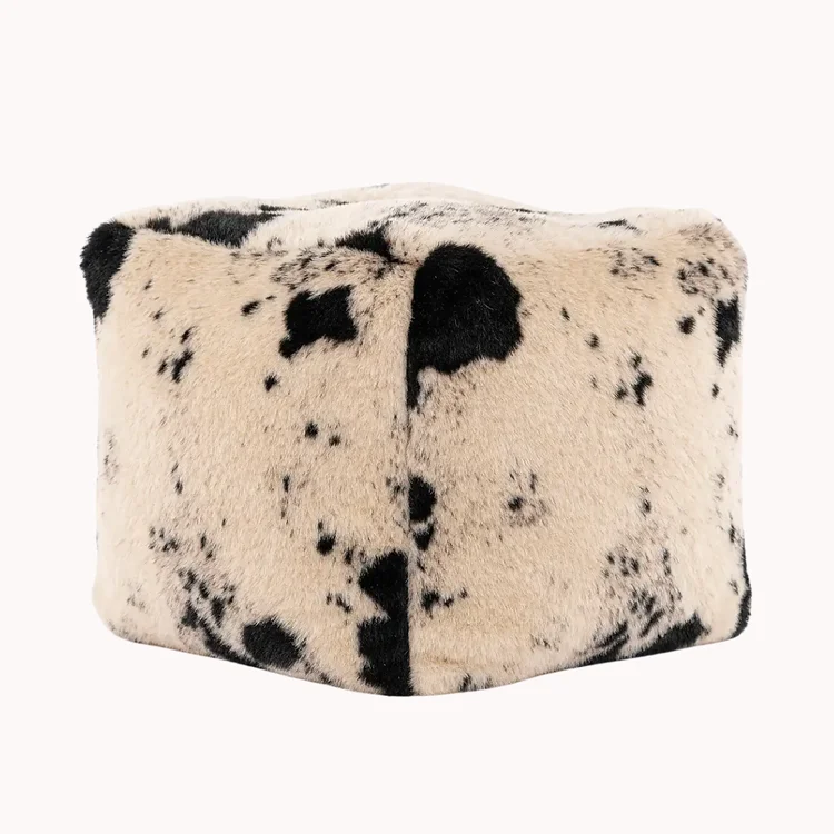 faux cowhide pouffe