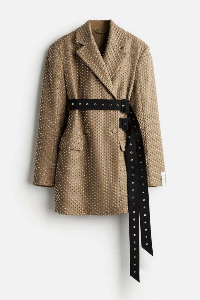 Beige Studded Wool Blazer with a black waist belt