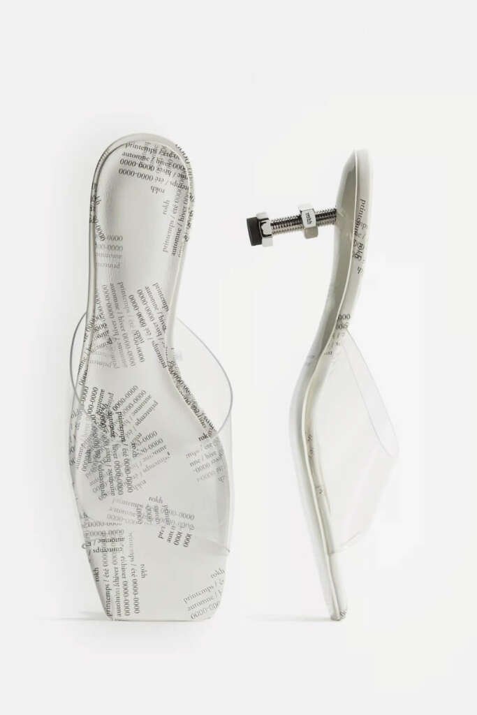 Transparent mules with leather insoles featuring an all over print featuring the designer logo. H&M x Rokh Collection