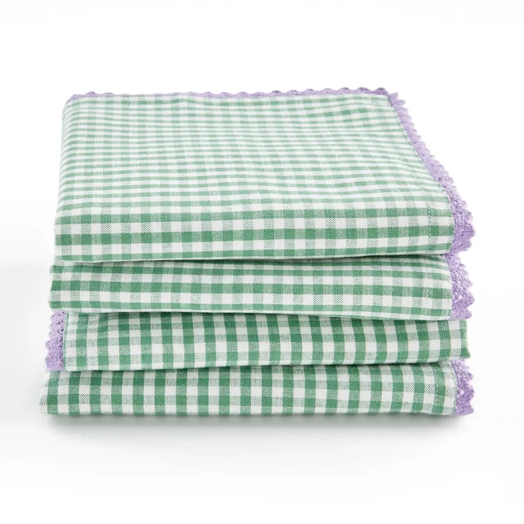 Green gingham table napkins with purple ruffles