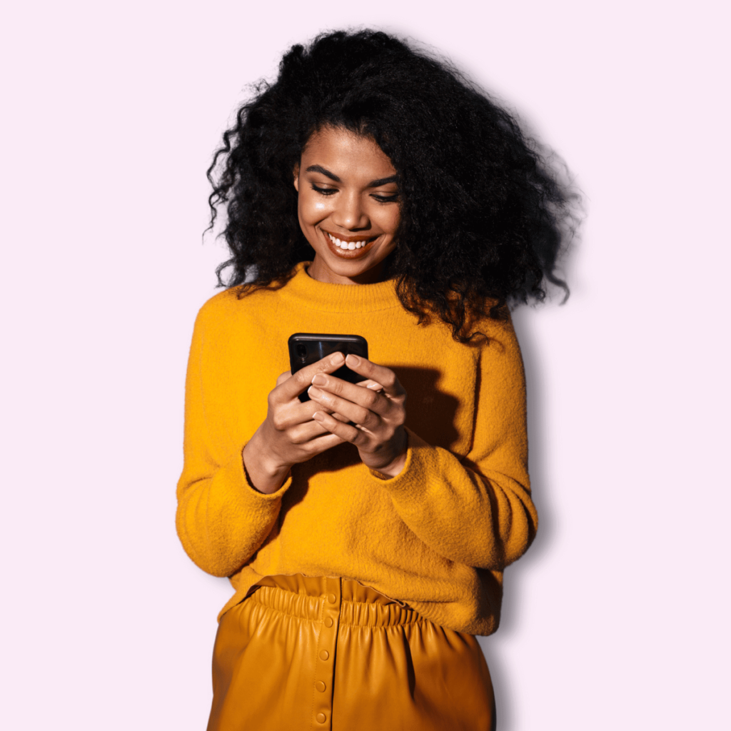 Smiling Happy Beautiful Black Woman Using Mobile Phone. 