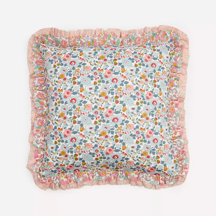 blue and pink floral cushion with ruffles