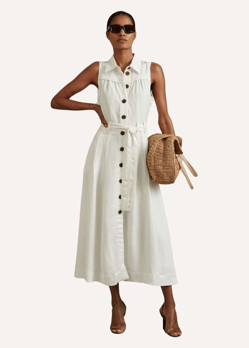 Model wearing a sleeveless button front Linen Belted Midi Dress. Best Casual White Summer Dresses