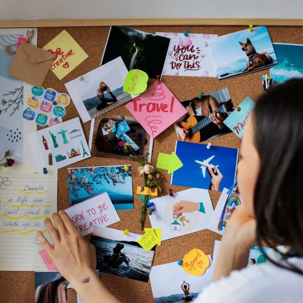 woman creating her own vision board. Feminine self care Vision Board