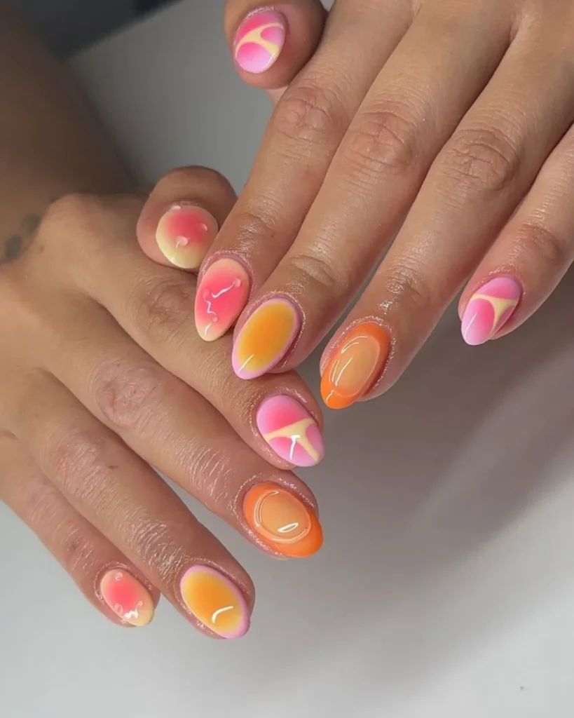 pastel orange and pink aura nails. Aura Nail Designs