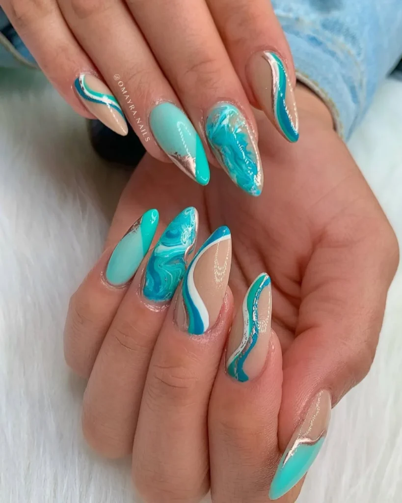 Ocean current style nails. aquamarine nail designs