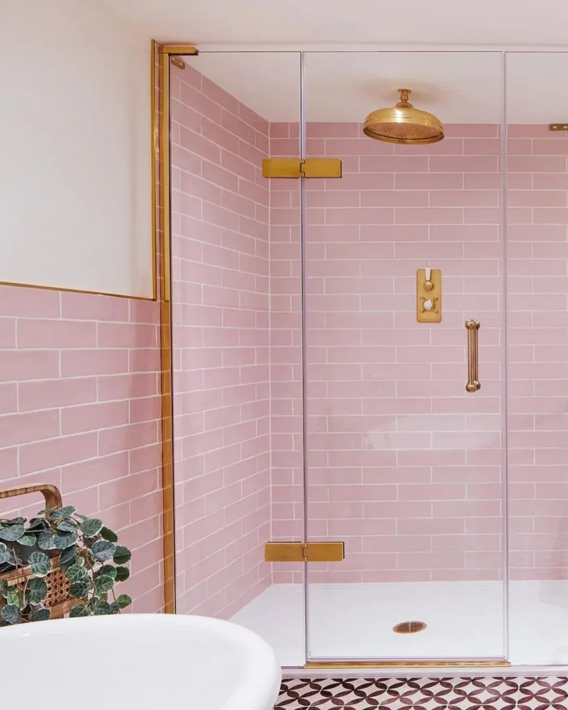 Pink bathroom with gold accents