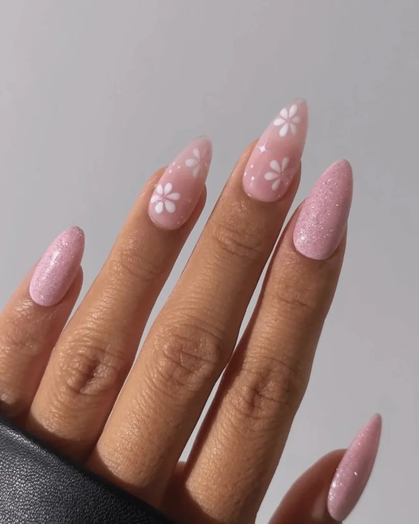 White and pink glitter nail design